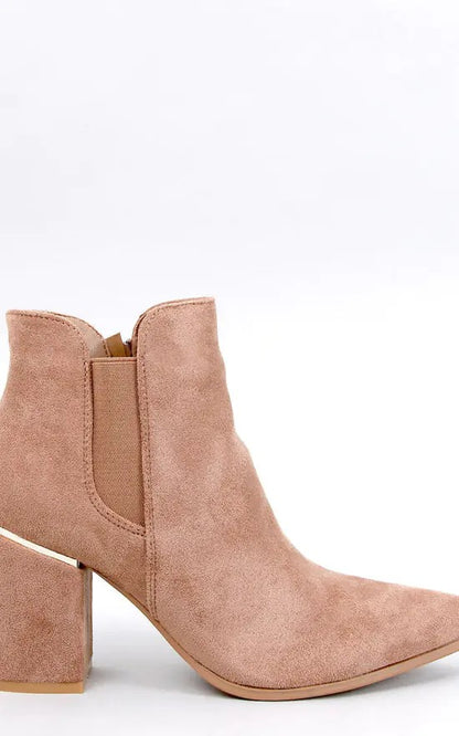 Nude suede ankle boot with a metal trimmed block heel