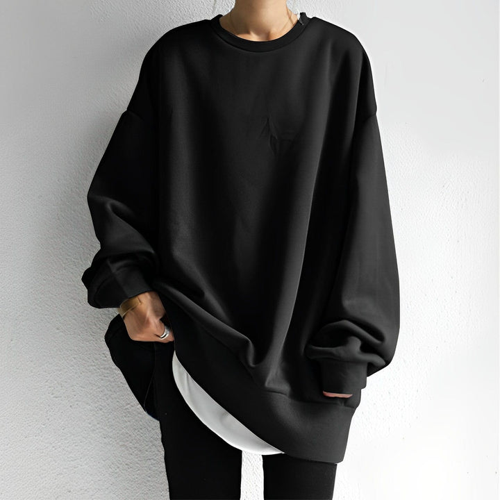 Black oversized crew neck sweatshirt with ribbed cuffs and hem, front view