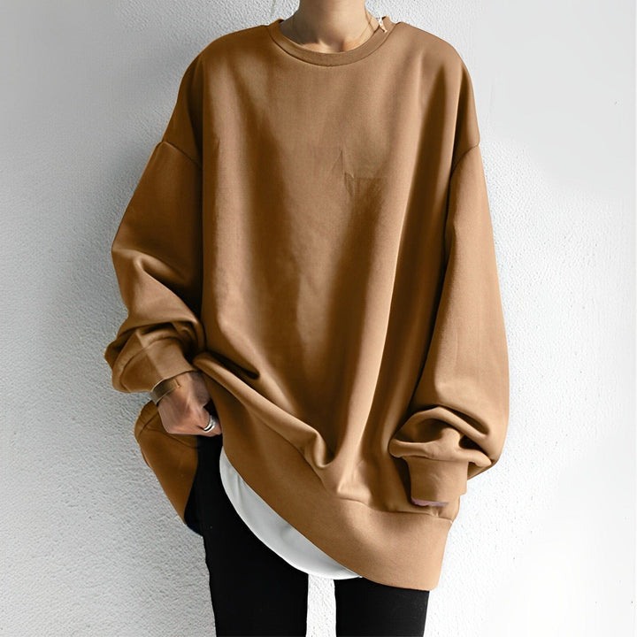 Camel oversized crew neck sweatshirt with dropped shoulders over black leggings