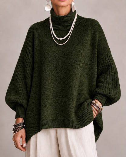 Dark green oversized turtleneck sweater with ribbed balloon sleeves, front view