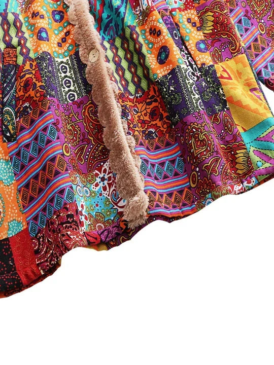 Close view of the patchwork print and sherpa lining at the hem