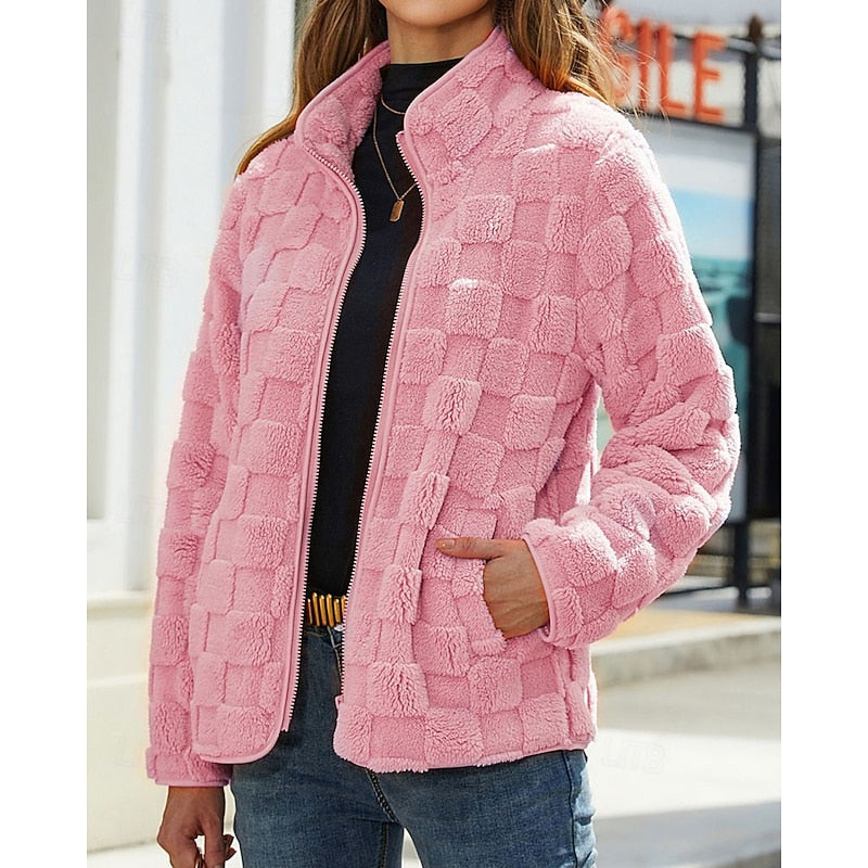 Pink checkerboard texture zip jacket worn open, front view