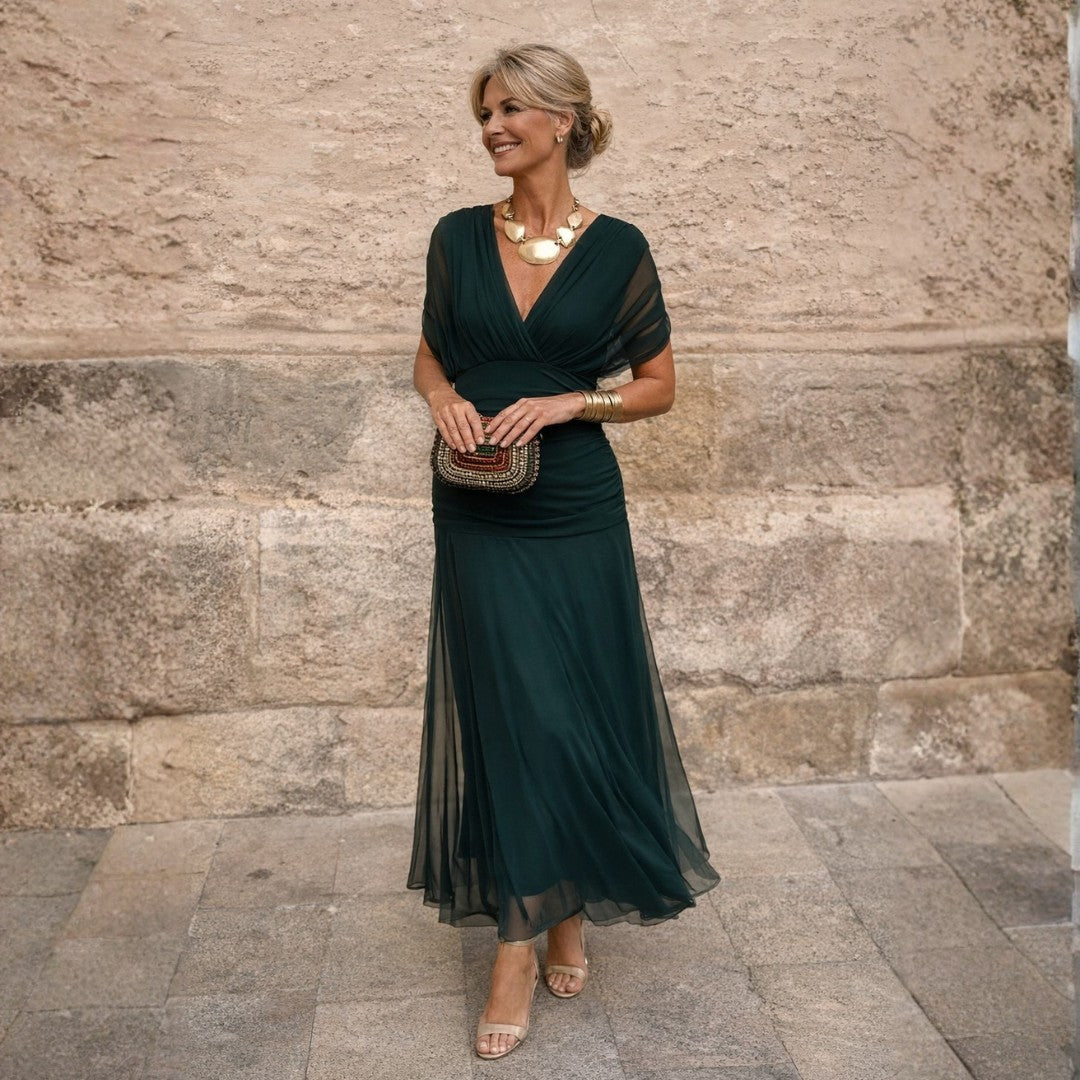 Dark green pleated wrap midi dress with short sleeves, front view