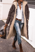 Brown quilted longline coat with cream sherpa lining, worn open