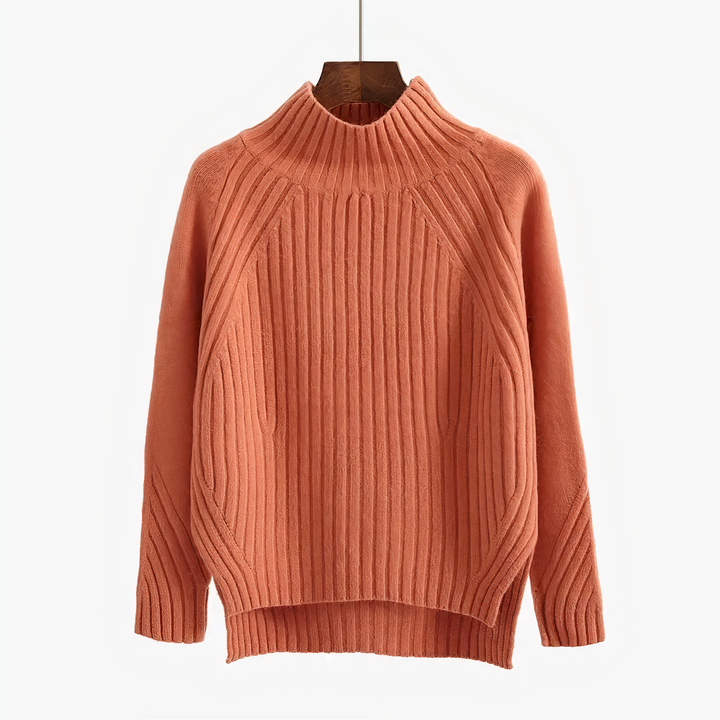 Coral wide rib mock neck sweater on a hanger with a stepped hem