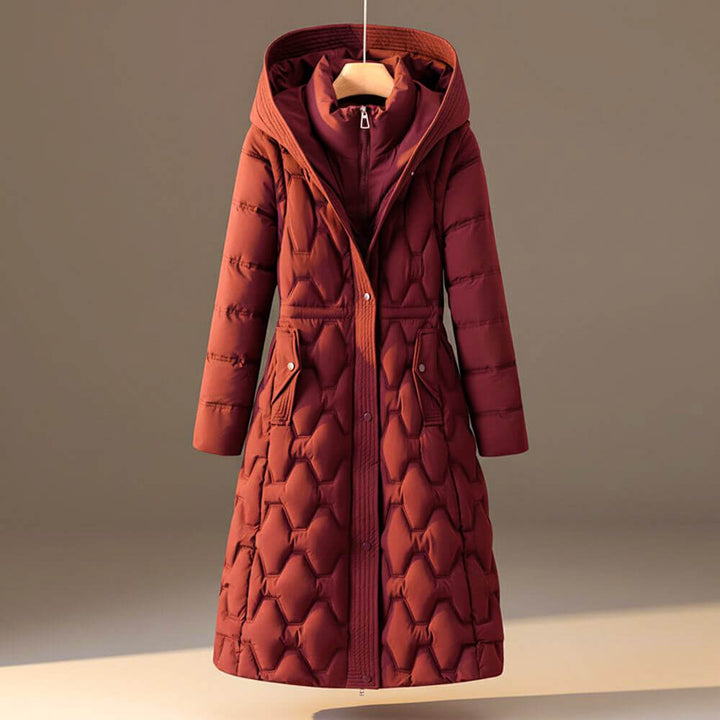 Rust red honeycomb quilted hooded coat shown from the front on a hanger