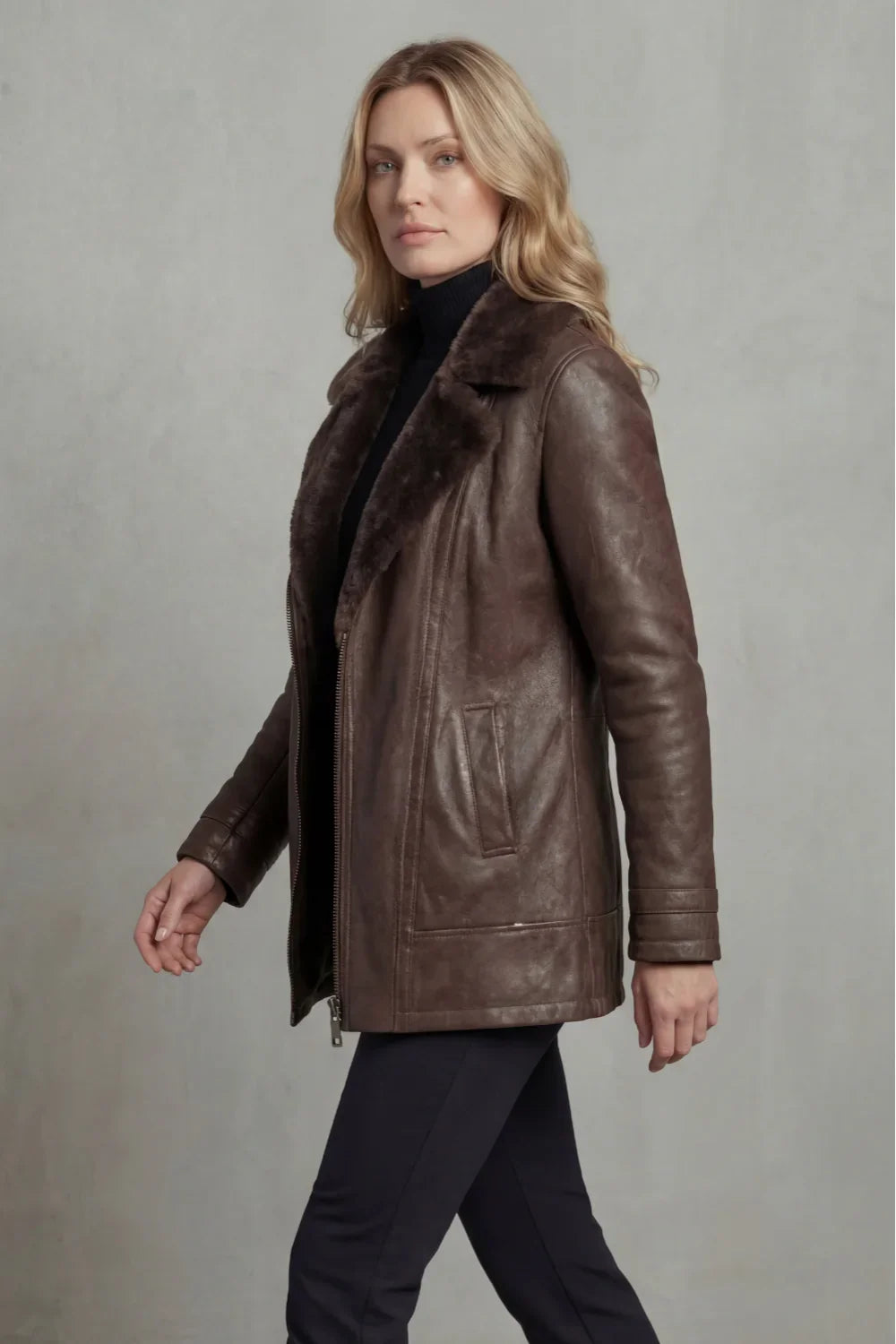 Side view of the brown shearling collar leather jacket