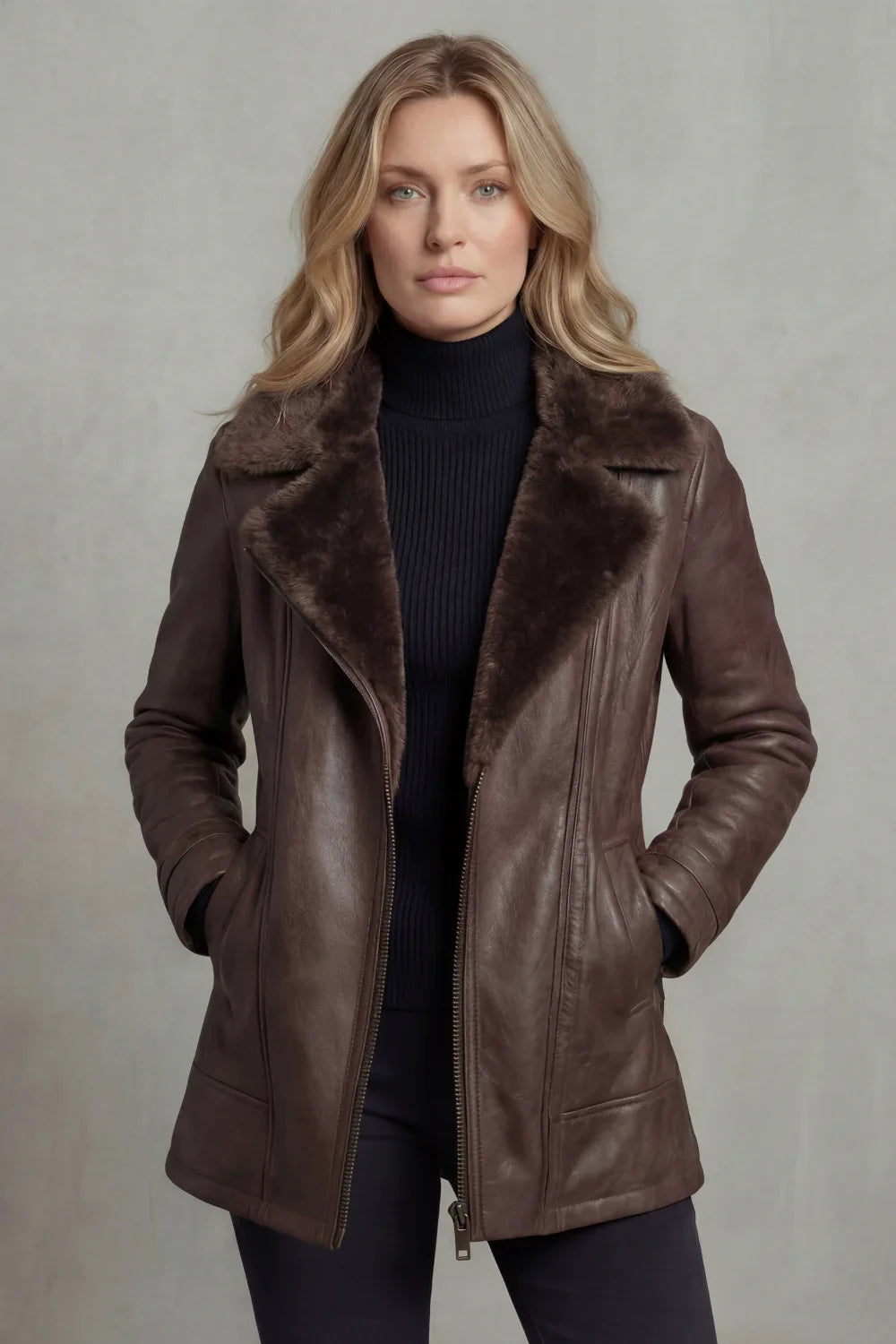 Shearling collar leather jacket worn over a black turtleneck