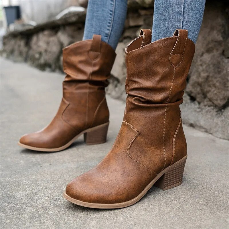 Camel slouch western boots with a stacked heel, front view