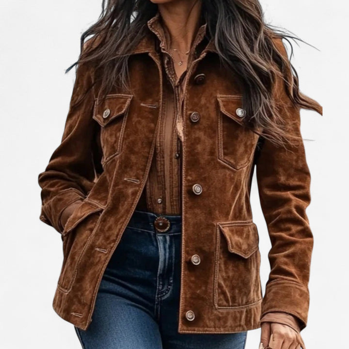 Brown suede look jacket with flap pockets worn over jeans, front view