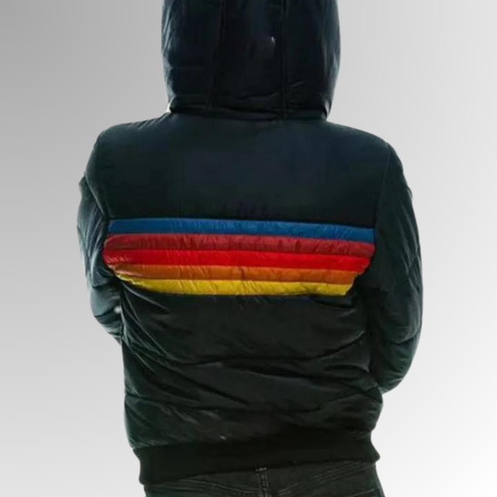 Back view of a black hooded rain jacket with blue red orange and yellow stripes