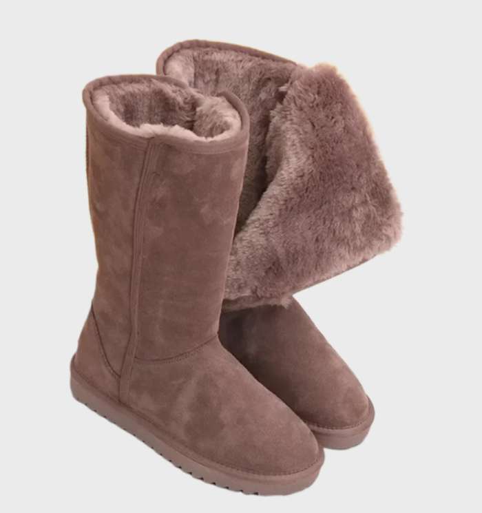 Taupe tall fleece lined boots with the fleece cuff folded out