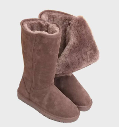 Taupe tall fleece lined boots with the fleece cuff folded out