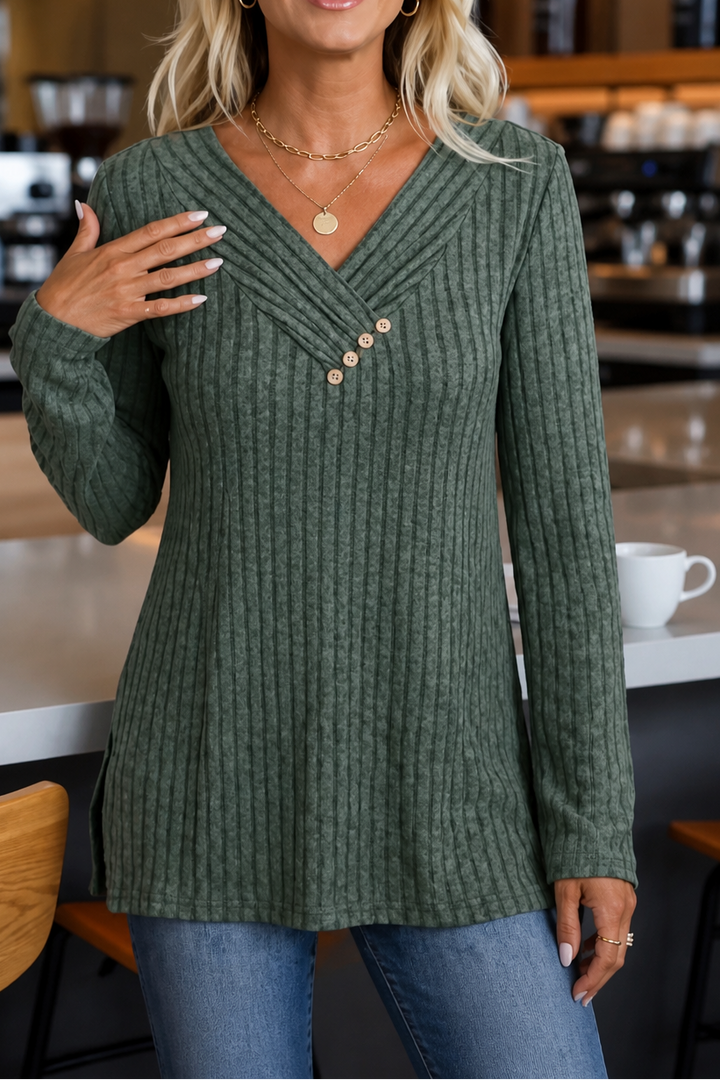Green ribbed knit top with pleated V neck and three wooden buttons, front view