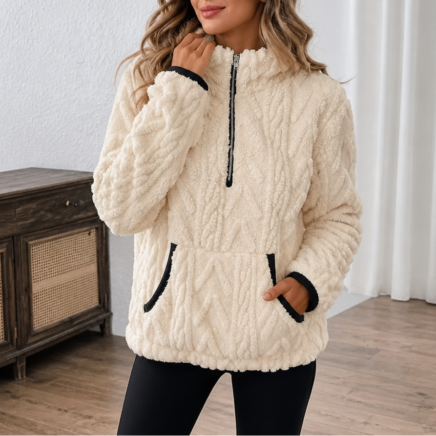 Ivory plush half zip fleece pullover with black trimmed pockets