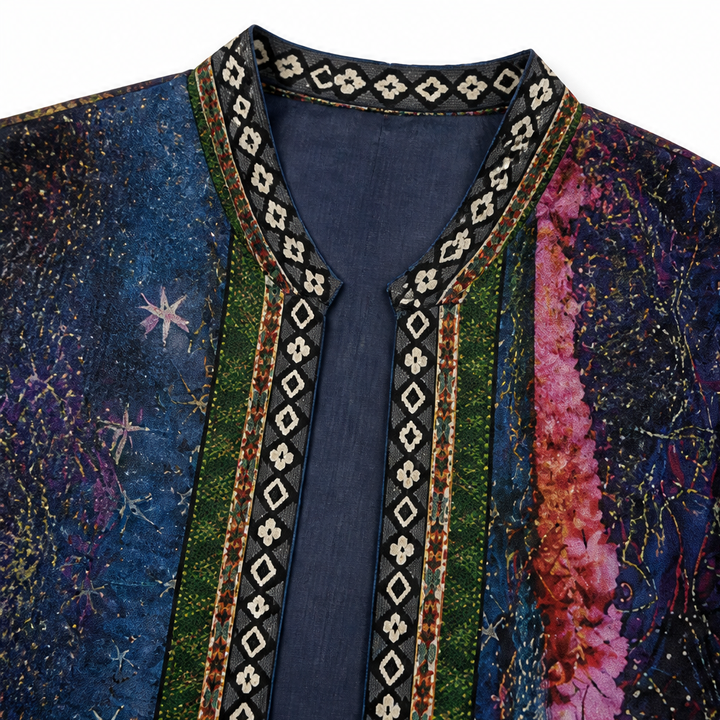 Embroidered braid trim at the neckline of an art print open jacket