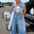 Light wash longline denim vest with an asymmetric hem and belt