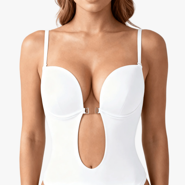 White plunge backless bodysuit with clear straps on a body