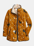 Mustard quilted jacket with a black cat, moon and star print and a stand collar