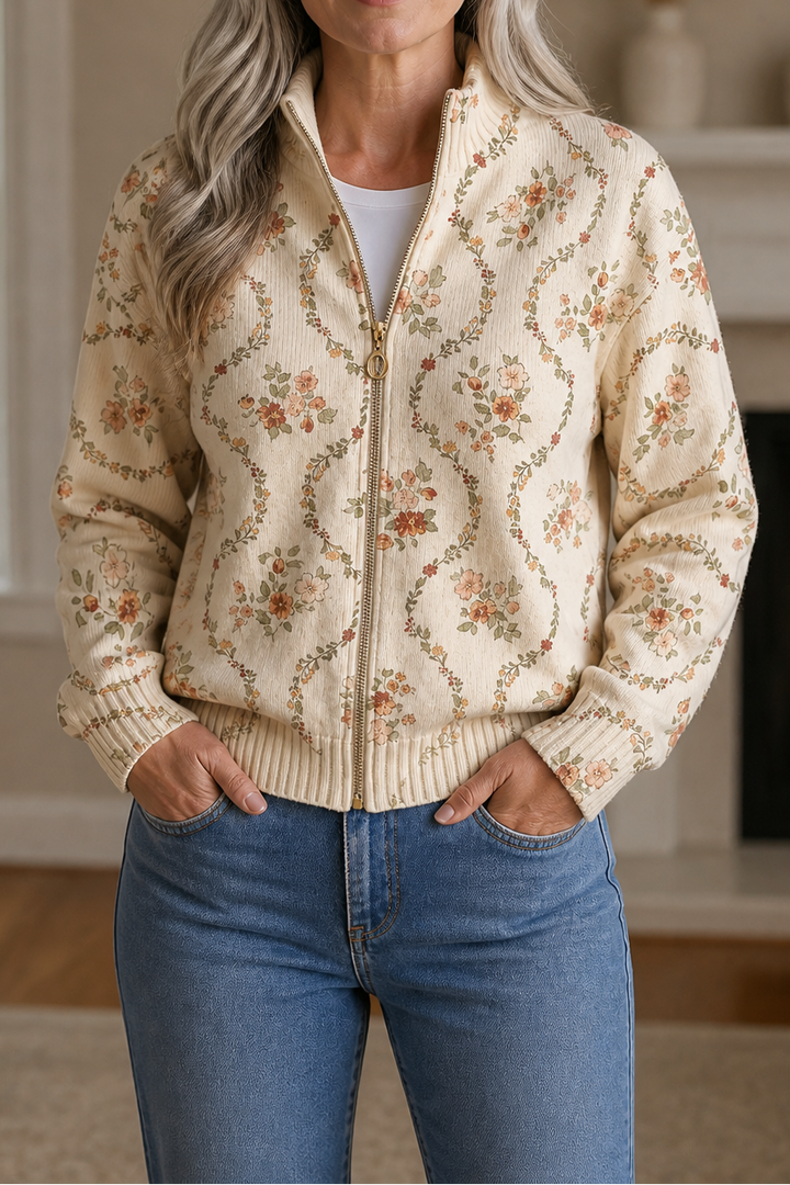 Ivory zip up bomber with a delicate scattered floral print