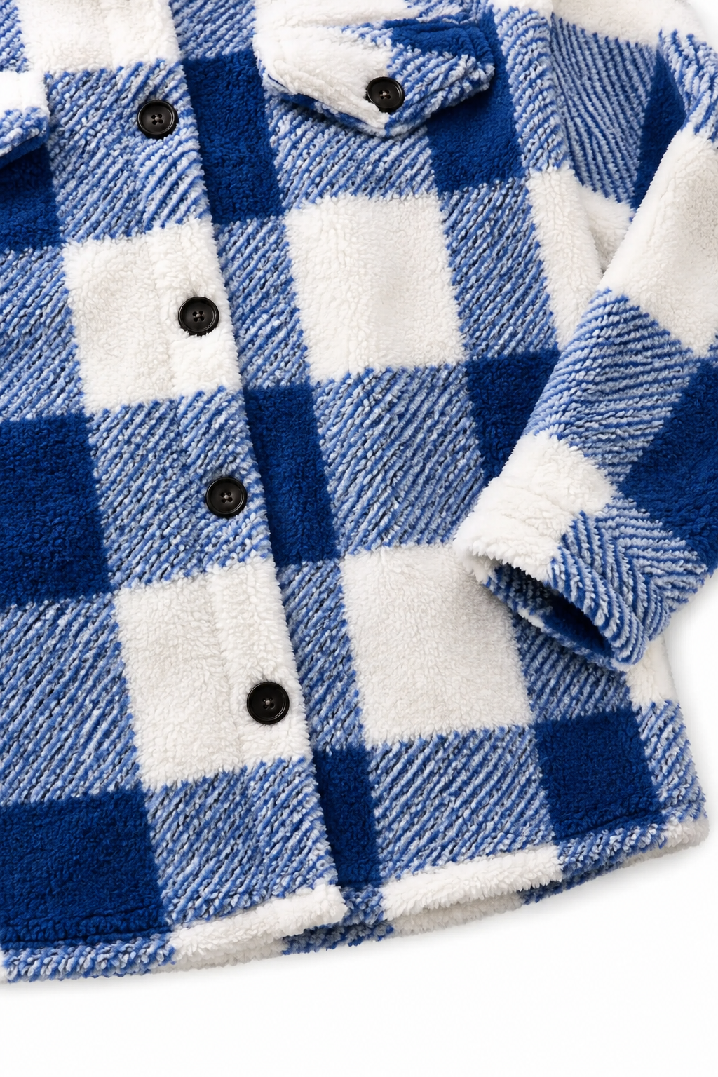 Blue buffalo check sherpa overshirt laid flat with the sleeve folded