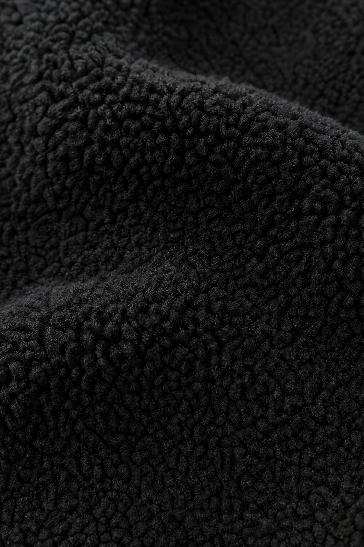 Close up of the black sherpa fleece pile