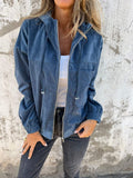 Blue corduroy zip-front hooded jacket worn with grey jeans