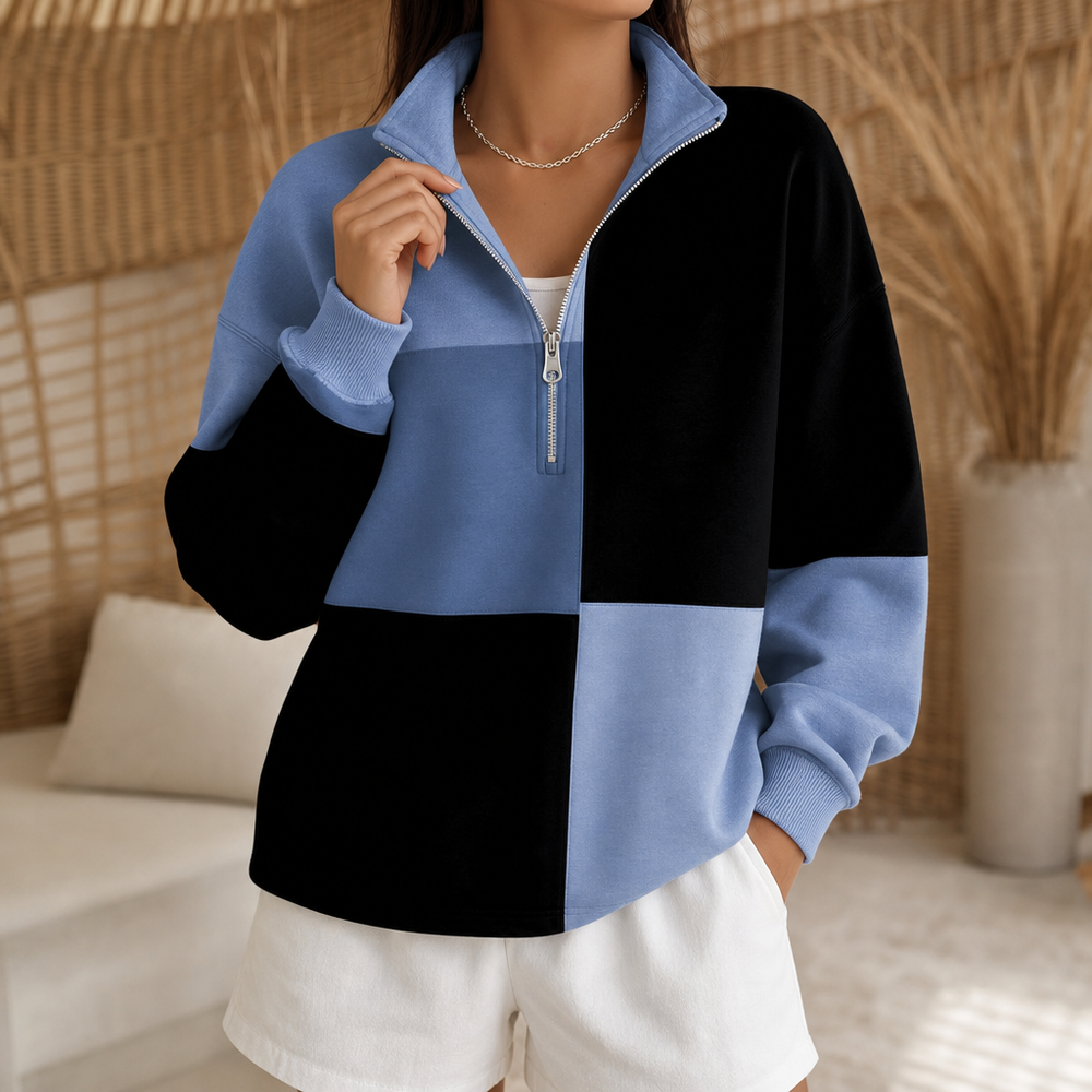 Colorblock half zip sweatshirt in blue and black with a quarter zip