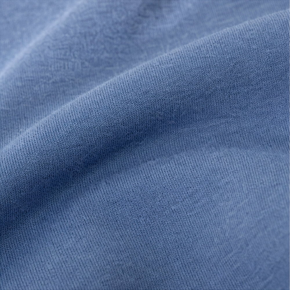 Close up of the soft brushed blue sweatshirt fabric