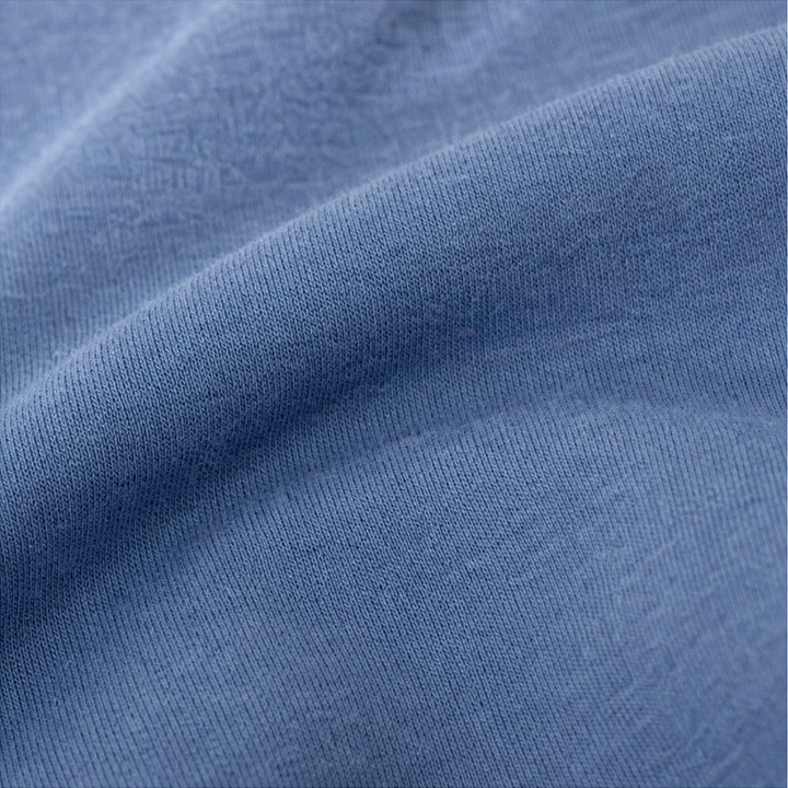 Close up of the soft brushed blue sweatshirt fabric