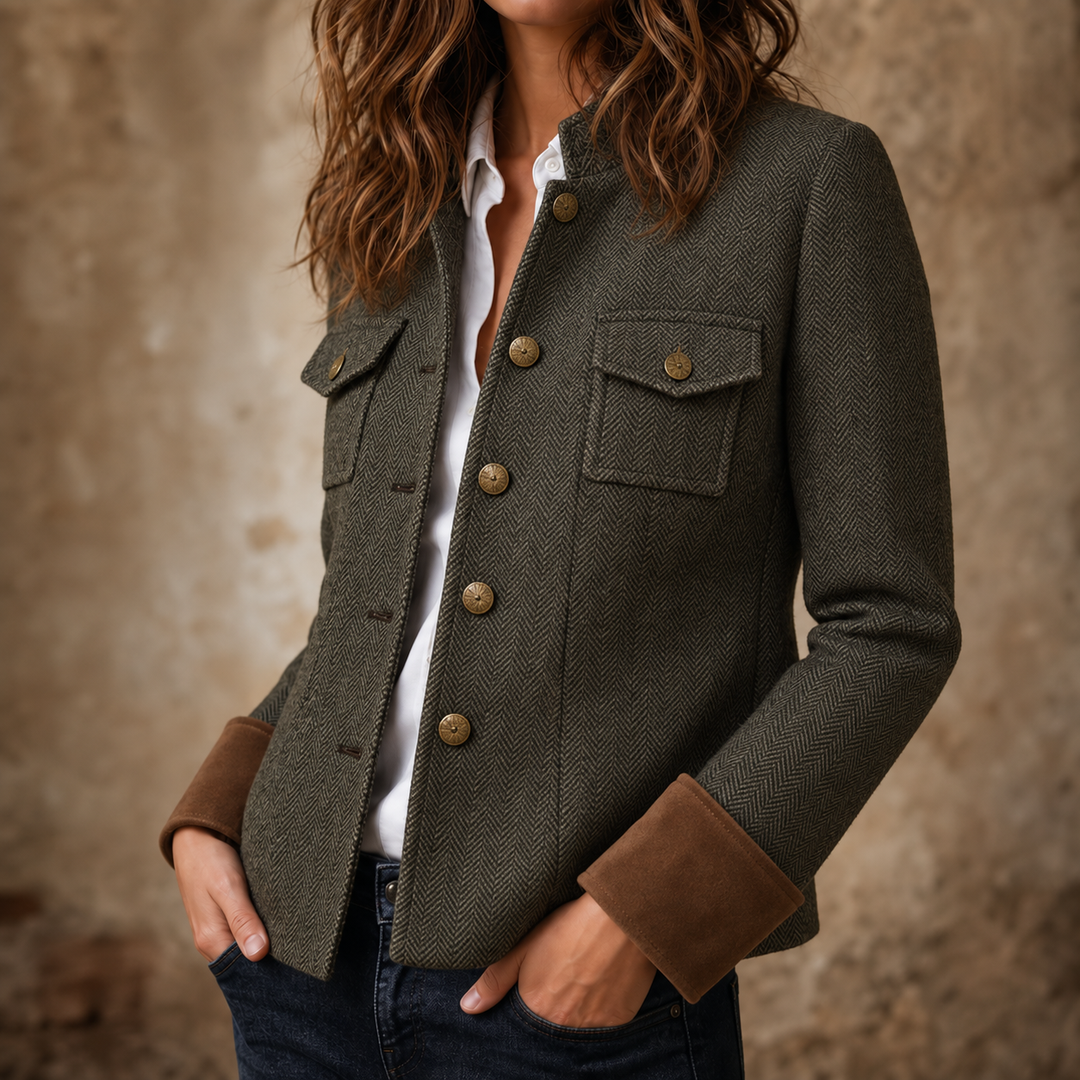 Olive herringbone jacket with chest pockets and tan turned cuffs