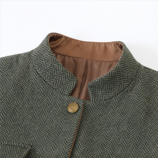 Close up of the stand collar and satin lining on an olive jacket