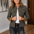 Olive herringbone jacket with contrast tan cuffs and brass buttons
