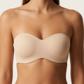 Nude strapless bandeau bra with moulded cups