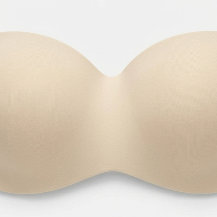 Close-up of the moulded cups on a nude strapless bra
