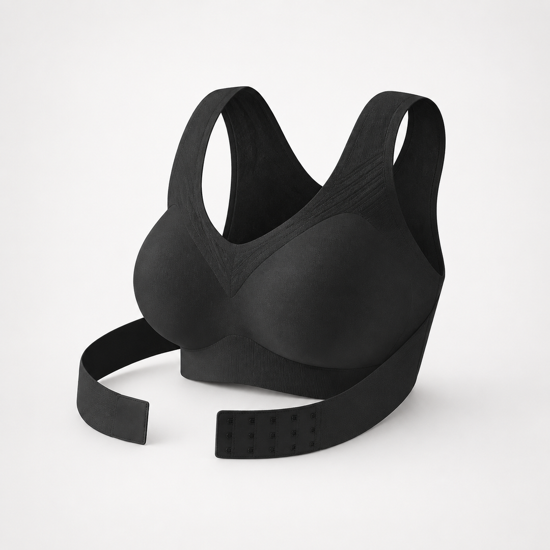 Black front-close wireless bra with cross-back straps on a plain backdrop