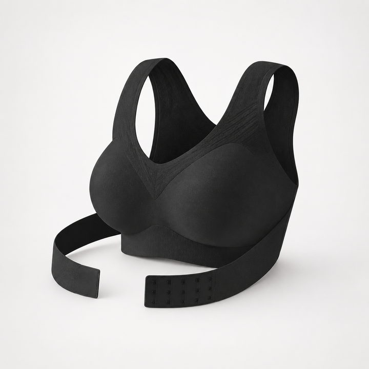 Black front-close wireless bra with cross-back straps on a plain backdrop
