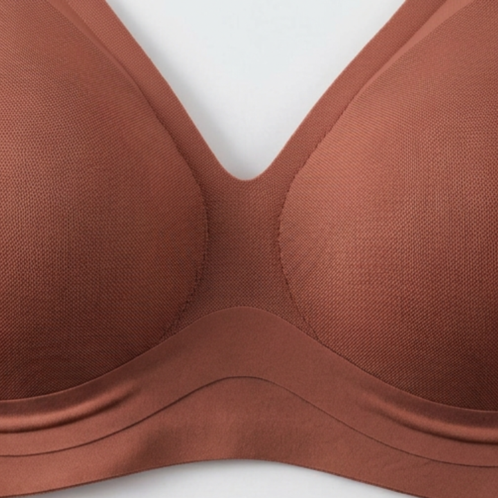 Close-up of the deep-V centre front on a rust wireless bra