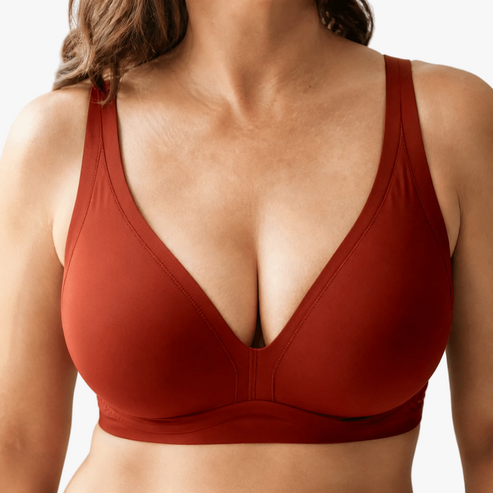 Rust deep-V jelly cup wireless bra worn on a body
