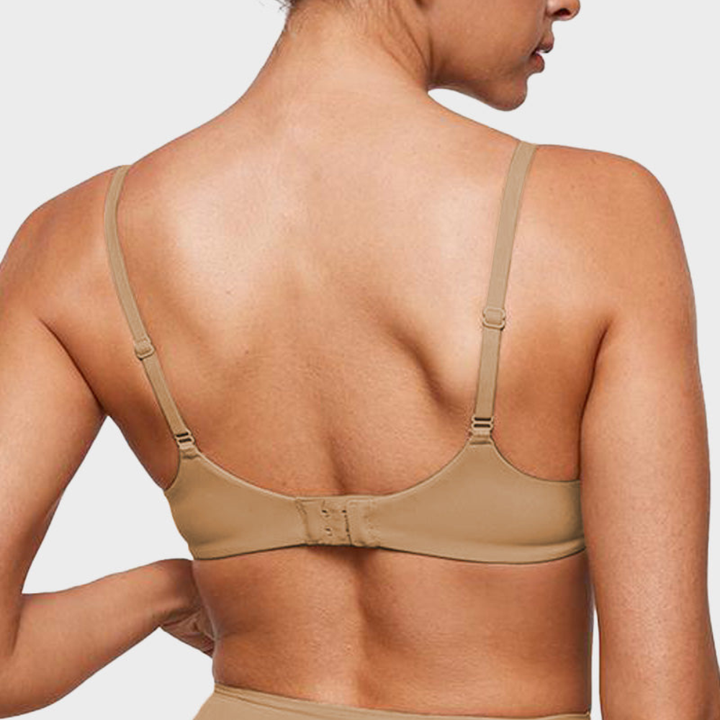 Back view of the nude bra with a low hook and eye band
