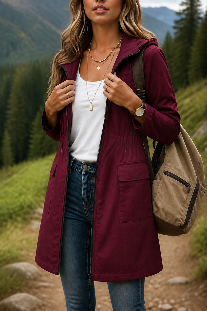 Burgundy hooded anorak jacket with a drawstring waist and pockets