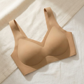 Nude wireless bra with contour cups laid flat on linen