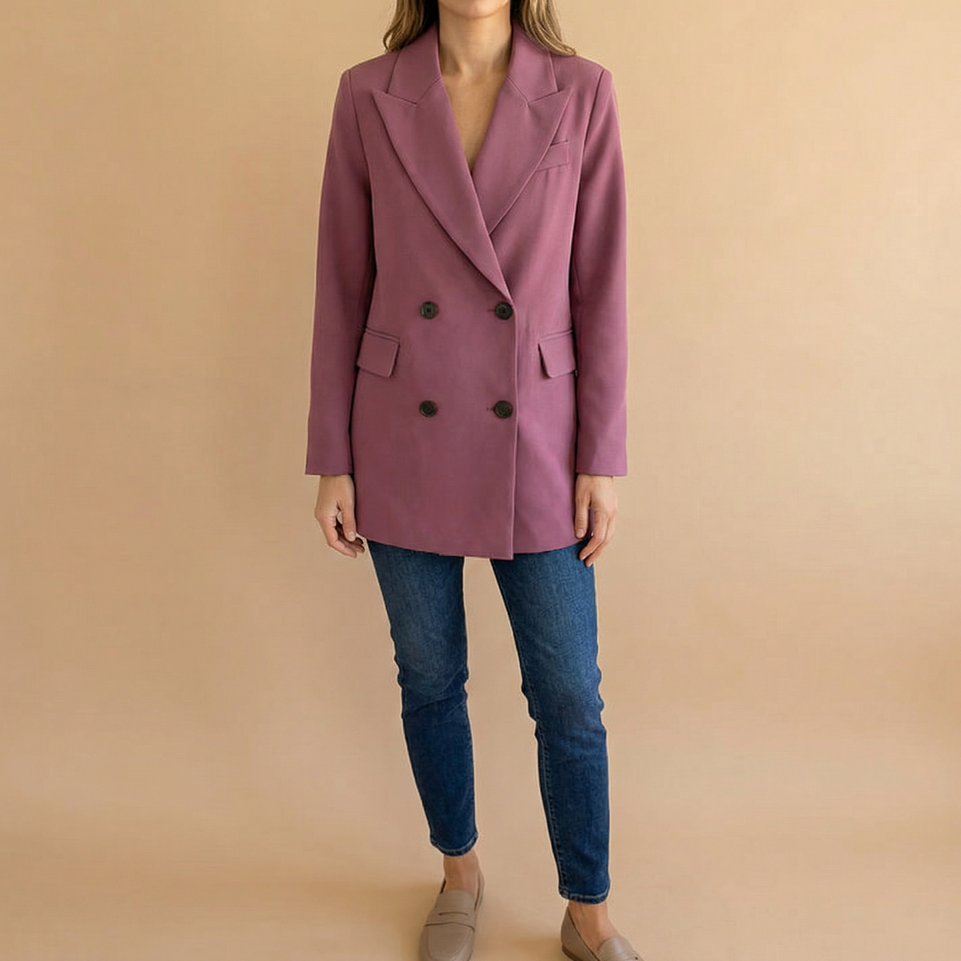 Mauve double breasted blazer worn with jeans, full length view