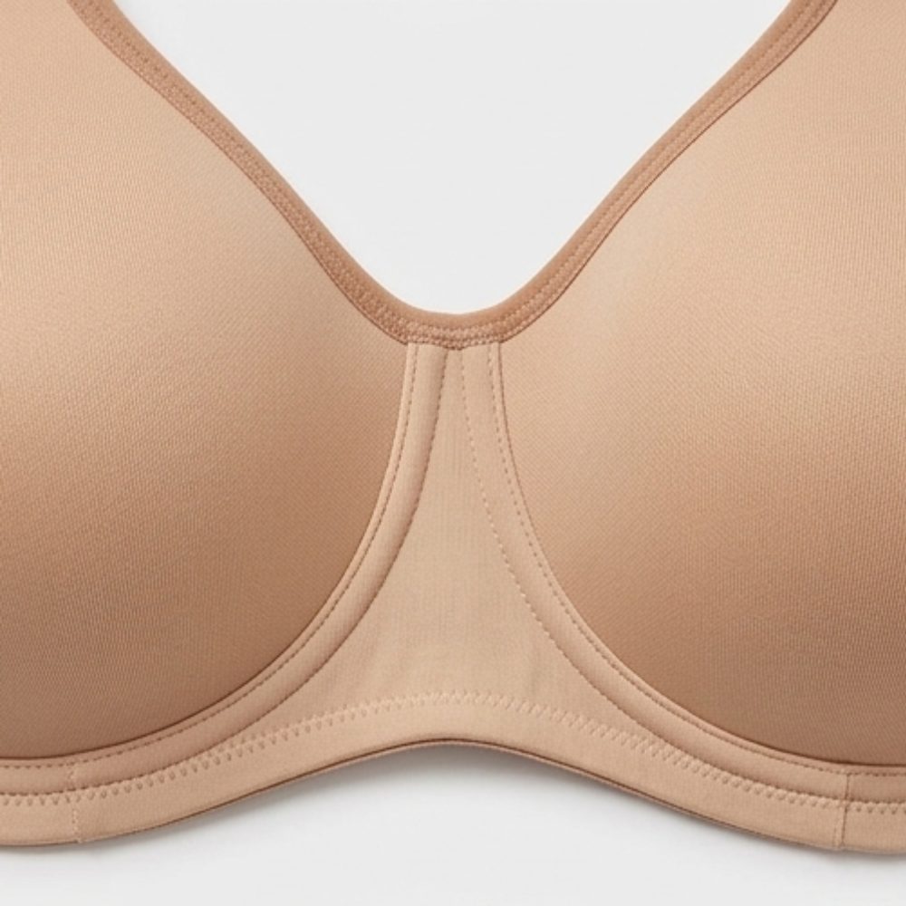 Close-up of the outside wire casing on a nude sports bra
