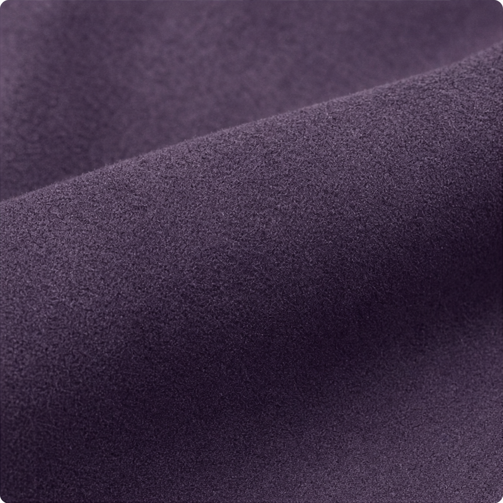 Brushed plum faux suede fabric on a blazer sleeve