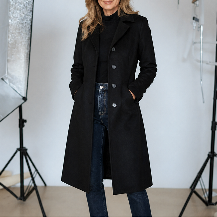 Black faux suede unstructured trench coat with a button front