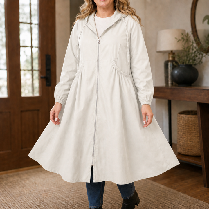 Cream flared hem peplum rain jacket with a gathered waist