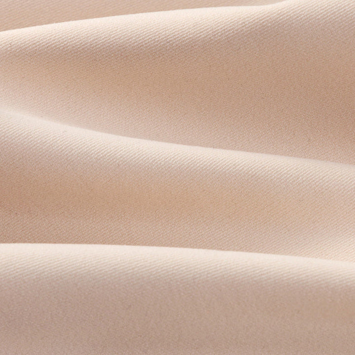 Close-up of the smooth nude bra fabric in soft folds