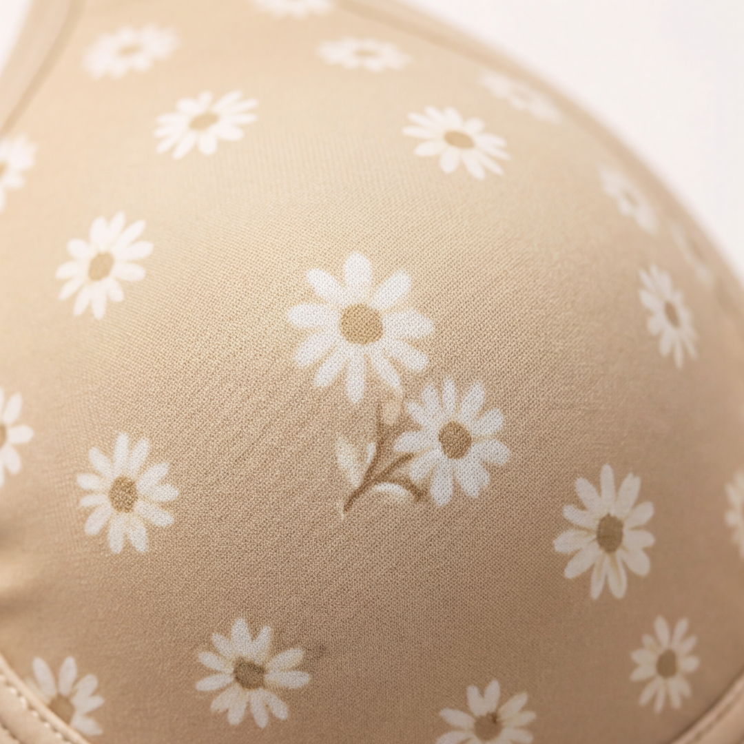 Close-up of the daisy print on a moulded bra cup