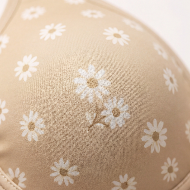 Close-up of the daisy print on a moulded bra cup